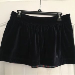 Dark blue velvet skirt.